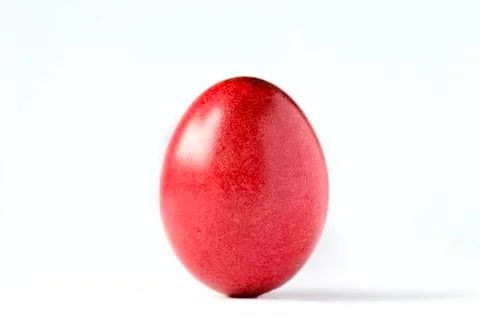 Close up of a red easter egg isolated on white. Stock Photos