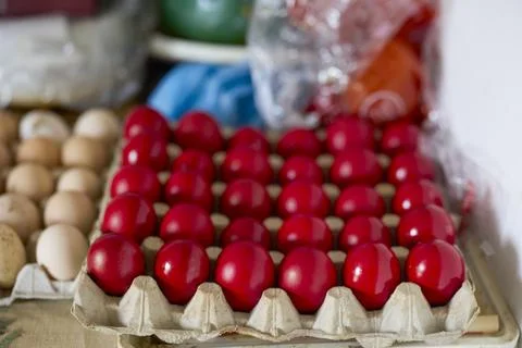 Close up of red eggs on a tray prepared for Easter traditions Stock Photos