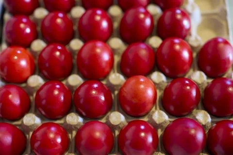 Close up of red eggs on a tray prepared for Easter traditions Stock Photos