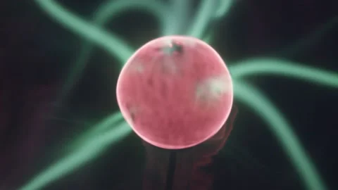 Close-up of the red electric ball from which the plasma streams emanate Stock Footage 145769016