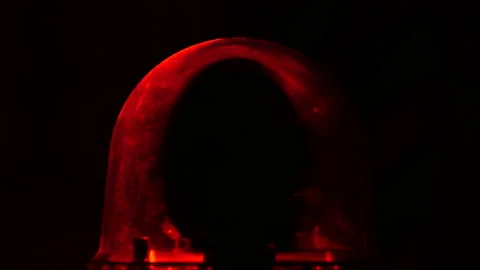 Close up of red flashing emergency light Stockbeeldmateriaal 162634142