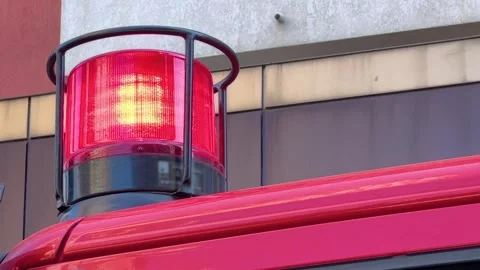 Close up of red flashing signal light on the fire truck, fire engine Video stock 336929272