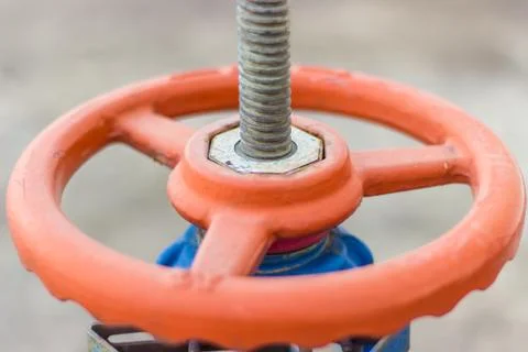 Close-up red gate valve and  screw Stock Photos