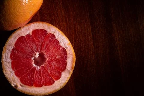 Close-up of a red grapefruit cut in half 库存照片