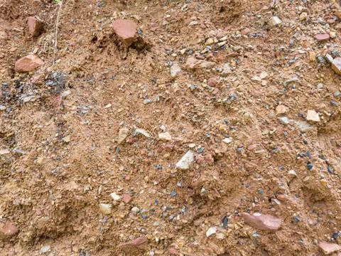 Close-up Red ground and small stones background Foto stock