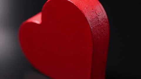 Close-up red heart on a dark background Video stock 170835488