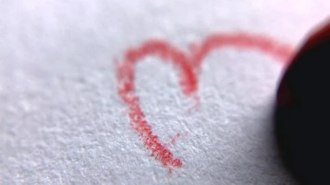 Close-up of red heart drawing by pencil on Valentine's day Stock Footage 101237662