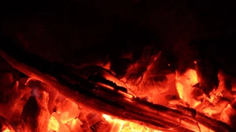 Close up red hot bbq coals in the barbecue during the night Stock Footage 202300776