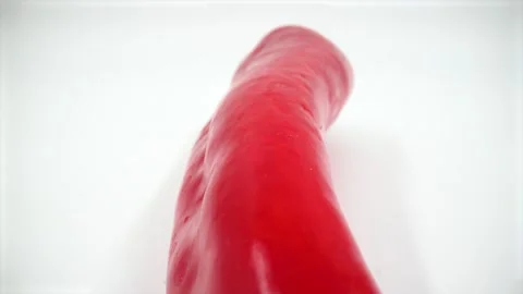 Close up of red hot chili pepper isolated on white background Stock Footage 332125854