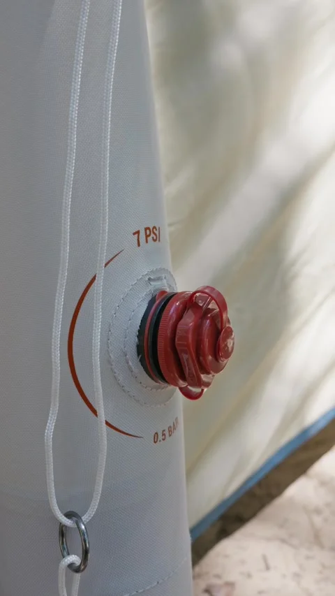 Close Up of Red Inflation Valve on Inflatable Tent Beam with Pressure Gauge Stock-Footage 341990711
