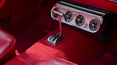 Close up of the red interior a classic vintage American Ford Mustang muscle 스톡 동영상 344029017