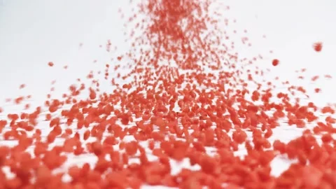 Close-up of red lentils fall on white background Video stock 305251180