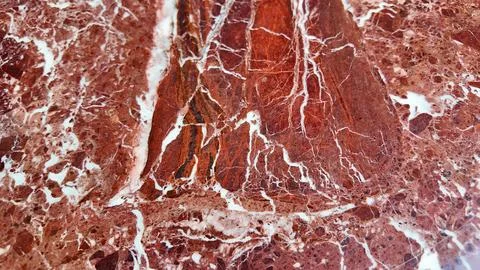 Close up of red marble with white patterns found in nature Stock Photos