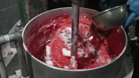 Close Up of Red Match Head Paste Being Stirred in Steel Mixing Bowl Vídeo Stock 339736897