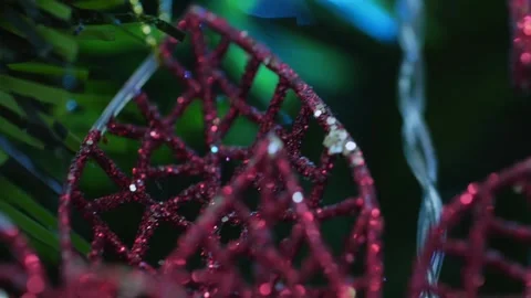 A close up of a red object with a lot of sparkles Stock Footage 278099657