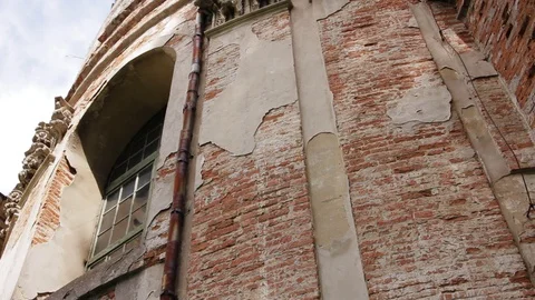 Close up red old brick wall window castle history architecture building city Stock Footage 98154214
