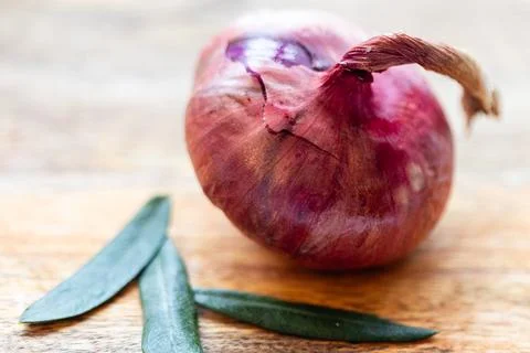 Close-up of a red onion on the table Stock Photos