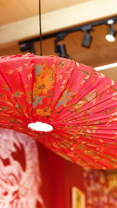 Close Up of Red Patterned Asian Lantern in Vertical Format Stock Footage 325828193