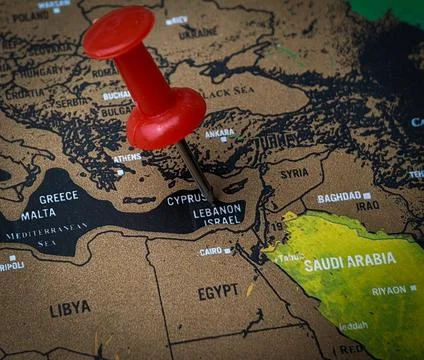 Close up red push pin pointing ISRAEL word Stock Photos