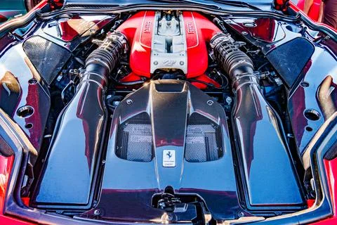 Close-up of a red race car engine bay, showcasing polished metal components.. Foto stock