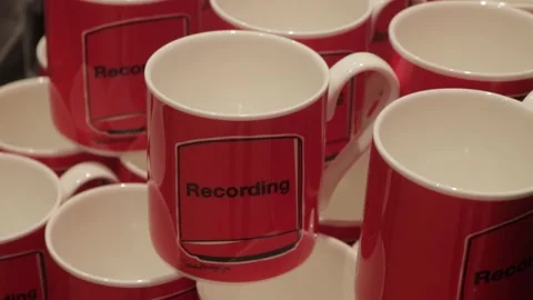 Close Up Red Recording Mugs at Abbey Road Studios Shop, London, UK Vidéo 334263384