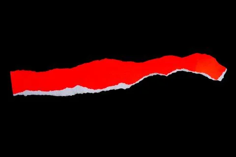 Close up of a red ripped or torn piece of paper with copy space, isolated b.. Stock Photos