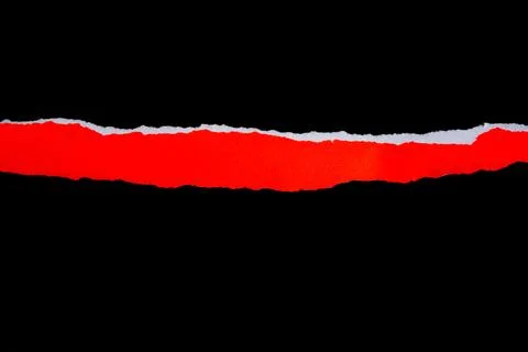 Close up of a red ripped or torn piece of paper with copy space, isolated b.. Stock Photos