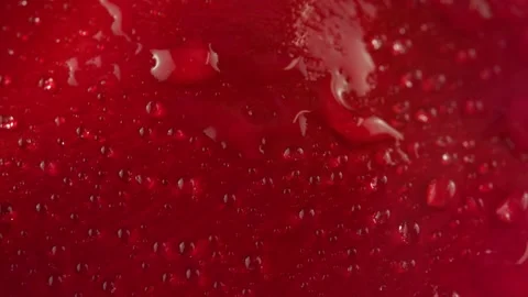 Close up of red rose petal texture with falling water drops Stock Footage 155355615