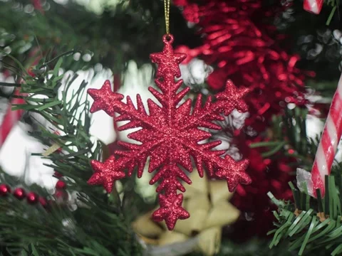 Close-up of red sequined Christmas tree star 5.8K video Stock Footage 299978807