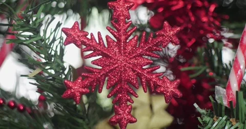 Close-up of red sequined Christmas tree star 4K video Stock Footage 299979257
