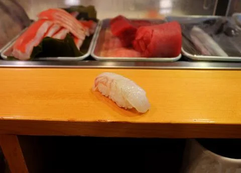 Close up red Snapper fish sushi on wooden table bar Stock Photos