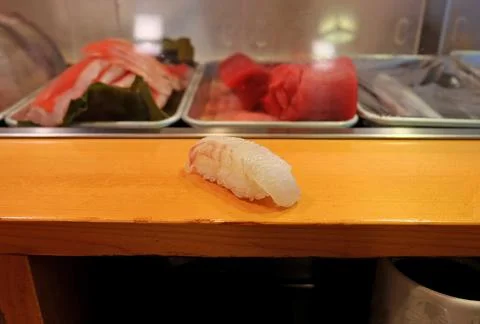 Close up red Snapper fish sushi on wooden table bar Stock Photos