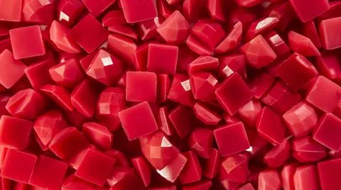 Close-up, red square diamonds for diamond embroidery. Hobbies and DIY, materials Stock Photos