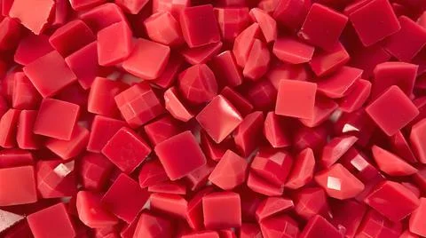 Close-up, red square diamonds for diamond embroidery. Hobbies and DIY, materials Stock Photos
