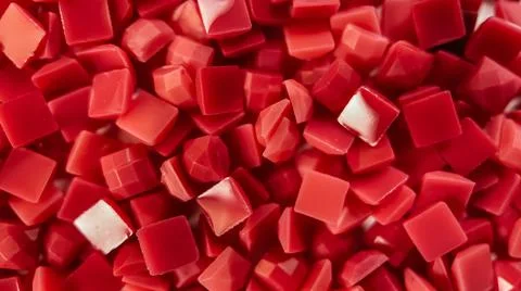 Close-up, red square diamonds for diamond embroidery. Hobbies and DIY, materials Stock Photos