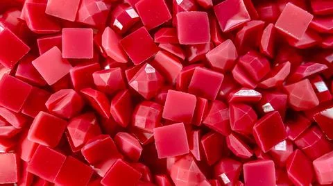Close-up, red square diamonds for diamond embroidery. Hobbies and DIY, materials Stock Photos