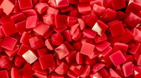 Close-up, red square diamonds for diamond embroidery. Hobbies and DIY, materials Stock Photos