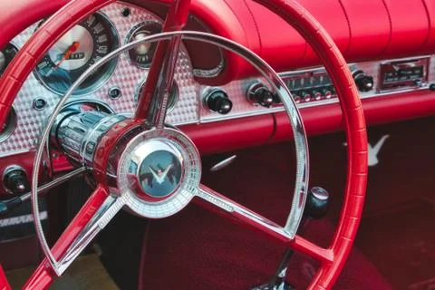 Close up of red steering wheel inside a Ford Thunderbird sports car Stock Photos
