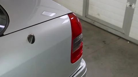 Close up red Tail light of Modern car. Car details. Shot of the tail light. Stock-Footage 186748682