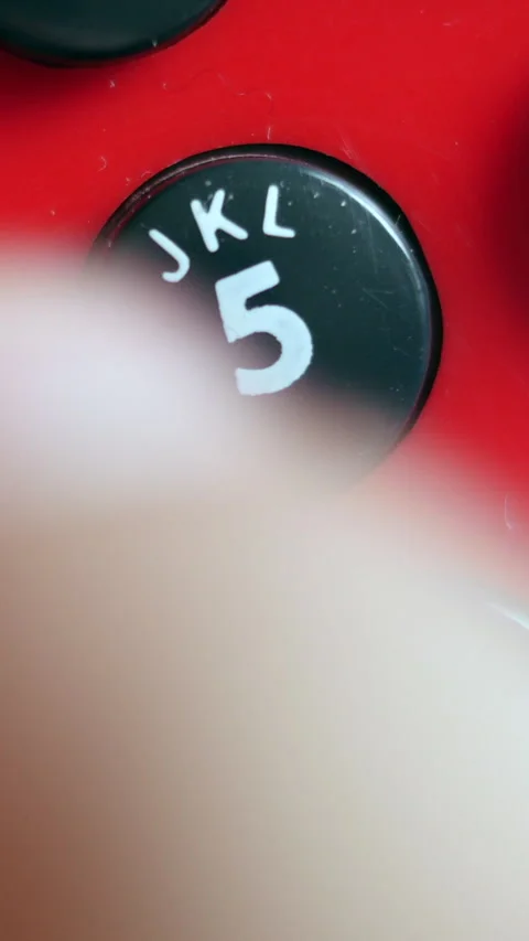 Close Up Of Red Telephone Number Five Button. Vertical. Stock Footage 303482169
