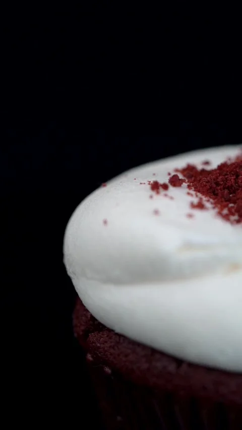 Close Up Red Velvet Cupcake with Cookie Crumbs Topping Stock Footage 330516780