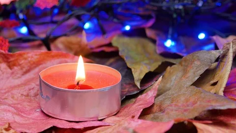 Close-up on a red wax candle. Stock Footage 99441920