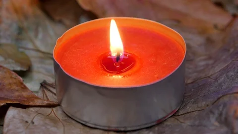 Close-up on a red wax candle. Video stock 99449704