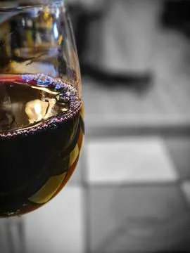 Close Up of Red Wine Glass with Reflection Photos