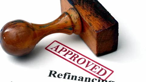 Close up of refinancing form approved Stock Footage 345007037