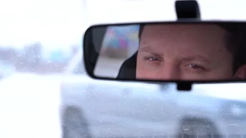 Close-up Reflection in the Rearview Mirror from the Passenger Seat Stock Footage 148108501
