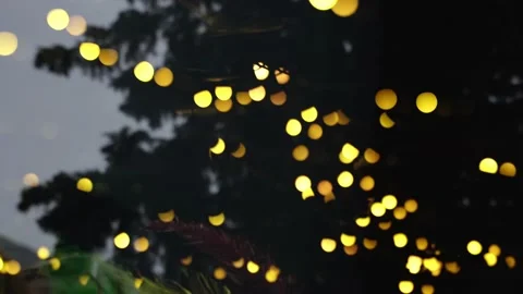 Close-up Reflection of yellow lanterns in the glass at the event Stock Footage 194512449