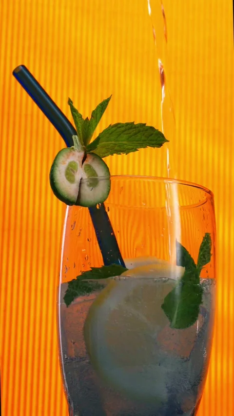 Close-Up of Refreshing Citrus Drink with Mint Video stock 337771981