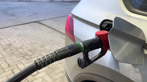Close-up of Refueling Grey or Silver Car From Petrol Station. Stock Footage 272876517