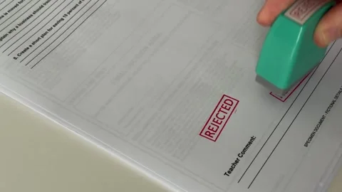 Close Up of Rejected Stamp Mark on Official Document Stock Footage 340395538